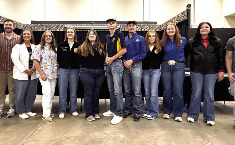 The Tecumseh School Board poses with students honored at the April meeting. Shown, from left, are unknown, Dylan Hayes, Nicole Sanchez, Iva Bingham, Rayleigh Hopkins, Olivia Rawlins, Landyn Seaton, Blake Wright, Kimberly Holland, Channing Goodson, Maci Peacock and Malachi Deatherage. Photos by Julie Talton, Countywide & Sun