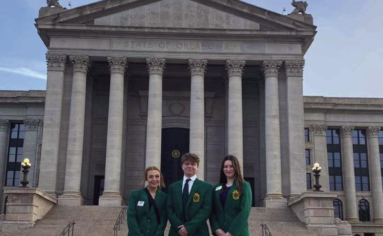 Kimberly Holland and Taylor Marrs, both of Tecumseh, and Grace Hobbs, of North Rock Creek, pause for a photo in front of the Oklahoma State Capitol for the 25th Annual 4-H Day on April 17. Photo provided.