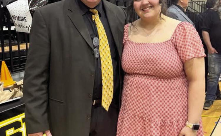 Tecumseh High School Band Director, John Outon poses with Drum Major Cheyanna Dietz at the last band concert of their high school careers on May 4, 2026. Photo provided