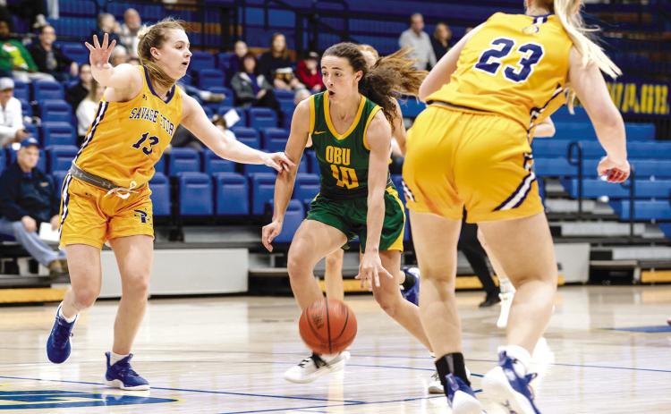 Bethel graduate and now OBU Freshman, Parker Stevenson, drives between two Southeastern defenders. The freshman guard Parker Stevenson was tabbed as Great American Conference Co-Player of the Week on Monday, after leading the Bison to a 56-54 comeback win at Southeastern Oklahoma State over the weekend.