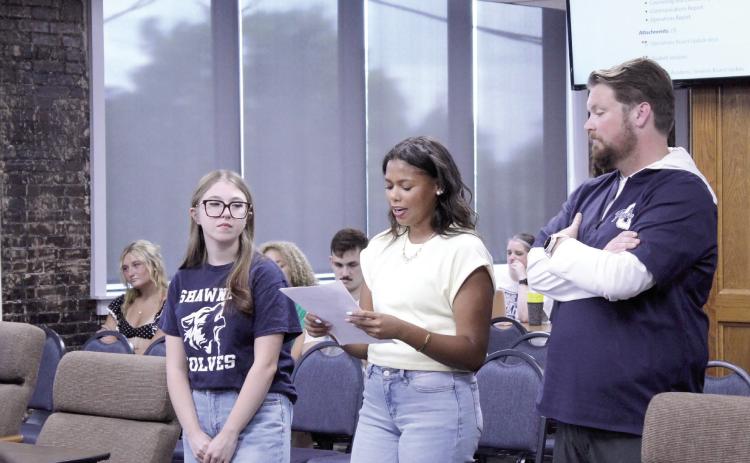 Shawnee Student Council member, senior Michale Young, speaks to the Shawnee Public Schools Board of Education about plans for one homecoming for the school year, which will include a dance and a parade, during the Aug. 10 meeting, as fellow senior and Stuco member, Kadence Jenkins, and Stuco Sponsor Ryan Boren look on. Photos by Natasha Dunagan, Countywide & Sun