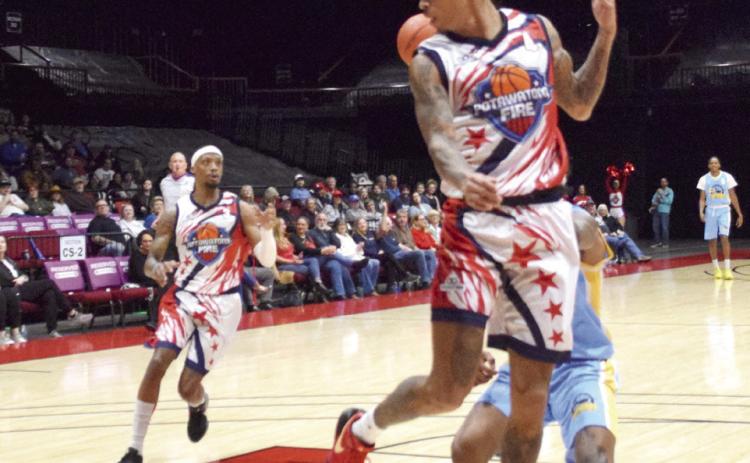 Ricky Artis II adds two to the board with an assist from Chuck Guy in the season home opener on March 8. Guy is the first to net 1,000 career assists in the league. The Fire is living up to their name with a 2-0 start to the season. Catch them at home at the FireLake Arena on Mar. 14 at 7 pm. Julie Talton, Countywide & Sun