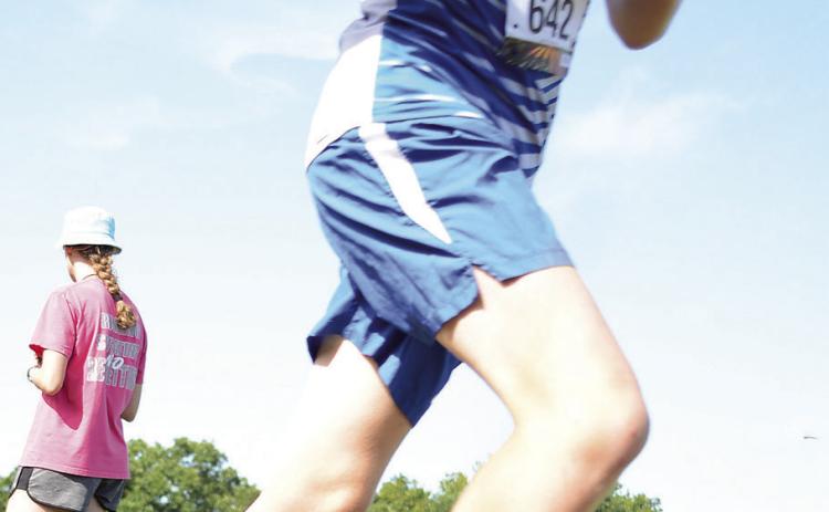 Bethel freshman Caleb Whitecotton competes in cross country in Stroud on Aug. 17. Photo courtesy of Brian Blansett.