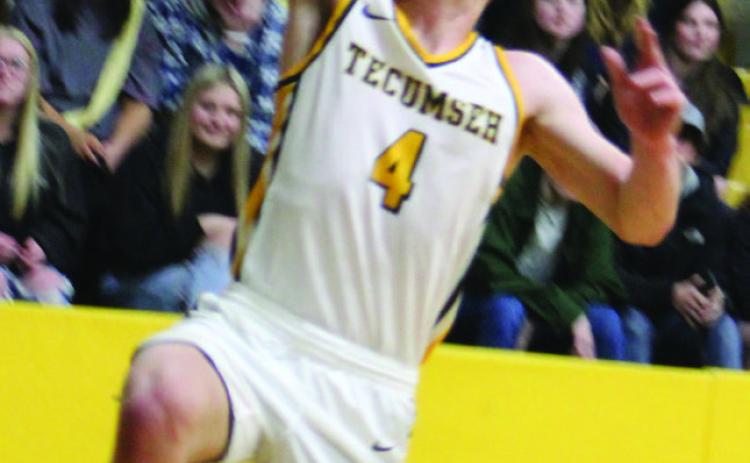 After stealing the ball, Tecumseh senior Brady Overstreet makes two points in the last minute- and-a-half of the homecoming game against Bethel on Feb. 3. One minute later, his teammate Jace Edwards made anothe r basket. The Savages lost, 61- 70. Countywide &amp; Sun/Natasha Dunagan
