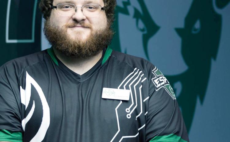 Glen Simpson coaches the new OBU Bison Esports program. OBU’s Smash Bros. team earned second place in the Great American Conference. Photo provided by OBU