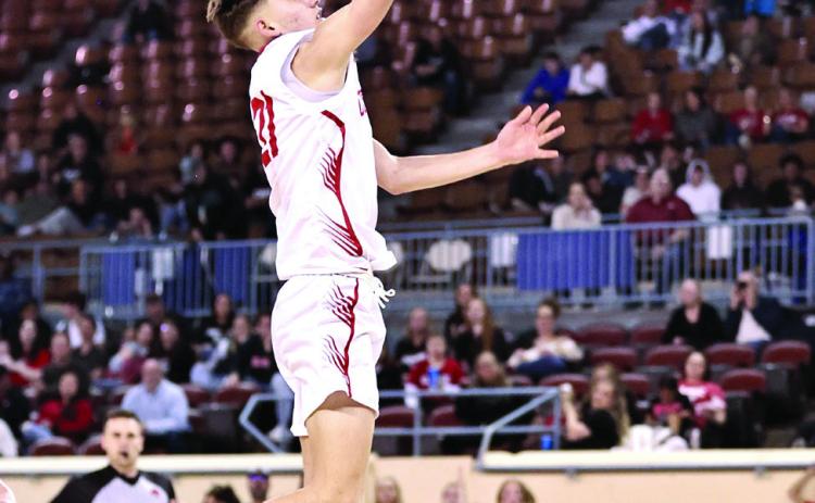 NRCs Jordan Coody soars to the rim for two in State Quarter-Final action Mar. 8. Photo courtesy of Gowin Photography