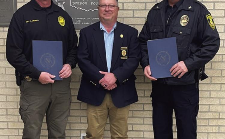 Kevin McCullough, the Law Enforcement Specialist for the Oklahoma Municipal Assurance Group, who also serves as the Chair of the Oklahoma Law Enforcement Accreditation Commission presented the Shawnee Police Department with the renewal of our agency’s accreditation. Pictured above from left are Chief Mason Wilson, Mc-Cullough, and Cpl. Kevin Nichols.