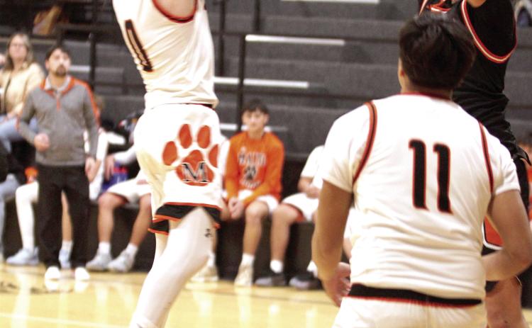 Maud sophomore Micah Brooks sinks a jumper during the third quarter of the Jan. 16 home game with Dewar.