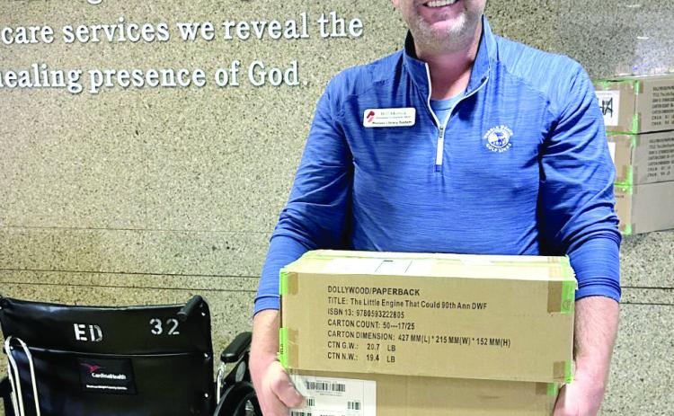 The Pioneer Library System Foundation donated another 1,000 Dolly Parton Imagination Library books to SSM Shawnee!! Pictured is Will Merrick, PLSF Development Officer, “This delivery represents what’s best about our community — people coming together to make sure every child has the chance to dream big, learn early, and grow strong.” Photo Provided