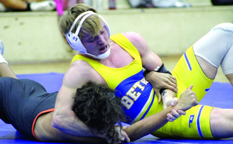 Bethel’s Brady Lower tries to flip Lexington’s Johnathan Minor in the Bethel High School Dual on Jan. 9. The overall final score for the meet was a victory for Bethel, 36-24. Countywide & Sun/Natasha Dunagan