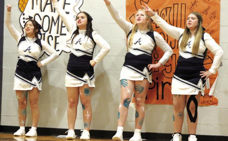Asher High School’s four varsity cheerleaders rally the Indians during the home games on Jan. 12. This is the first year for Asher to restart their cheerleading program. Shown, from left, are Cristi Tubbesing, Tianndra Reddin, Laci Whittle and Chloee Dobbs. Countywide & Sun/Natasha Dunagan