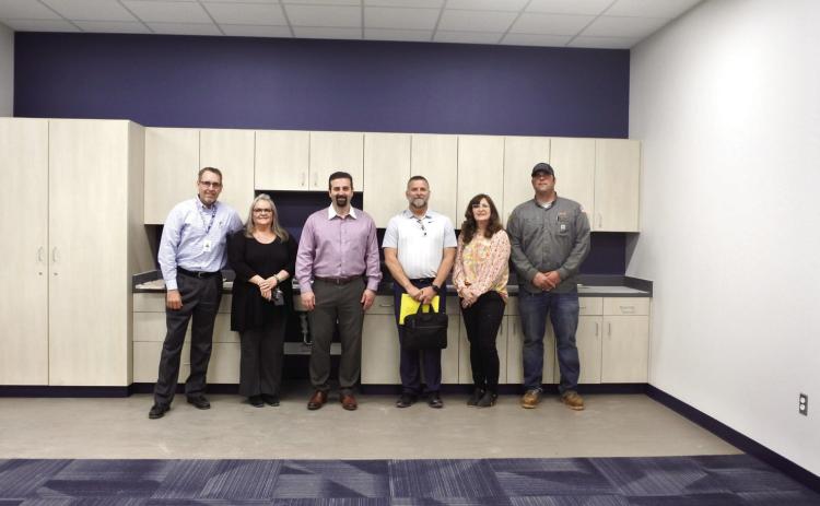Superintendent Dr. Matt Posey, Principal Tammy Cook, Brandon Bussell, David Elmore, Susan Watson, and P.J. Gibson pose in one of the finished classroom at the end of the tour of the new Upper Elementary. Countywide &amp; Sun/Suzie Campbell