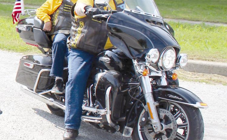 Ralph “Rowdy” Butler participates in the Roll to Wreaths Riders 4 Vets Memorial Day ride this past May. Butler has driven a truck for Wreaths Across America for 10 years now and began the Roll to Wreaths Riders 4 Vets organization to raise money for it. There will be a ceremony for National Wreaths Across America Day at the W.P. Wood/THS Alumni Center on Dec. 16 at 11 am. File photo.