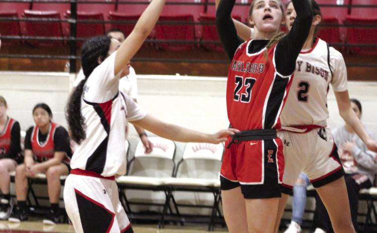 Earlsboro sophomore Xalina McCarroll aims for the bucket and sinks it during the fourth quarter of the Class B Regionals against Geary on Feb. 15. The Lady Wildcats won that game, 52-38, and lost their second regional game, with Sasakwa, 37-60. Countywide &amp; Sun/Natasha Dunagan