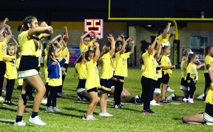 On Oct. 7, the Tecumseh High School cheerleaders performed with their junior cheerleaders. The junior cheerleaders ranged from pre-k all the way to sixth grade. They learned cheers and a dance during “kids clinic.” Payton Worley and all of the THS Cheerleaders helped in coaching the kids. Countywide &amp; Sun/Natasha Dunagan