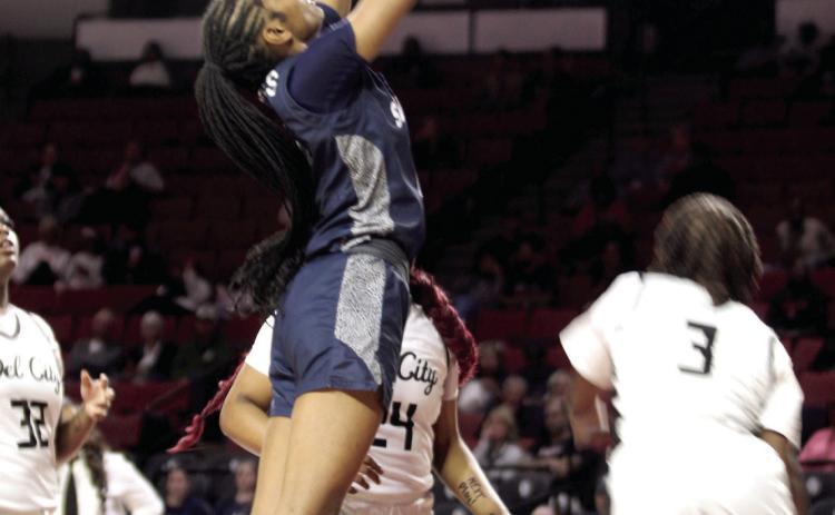 Shawnee junior JaNya Bruner adds two points. Photos by Natasha Dunagan, Countywide & Sun