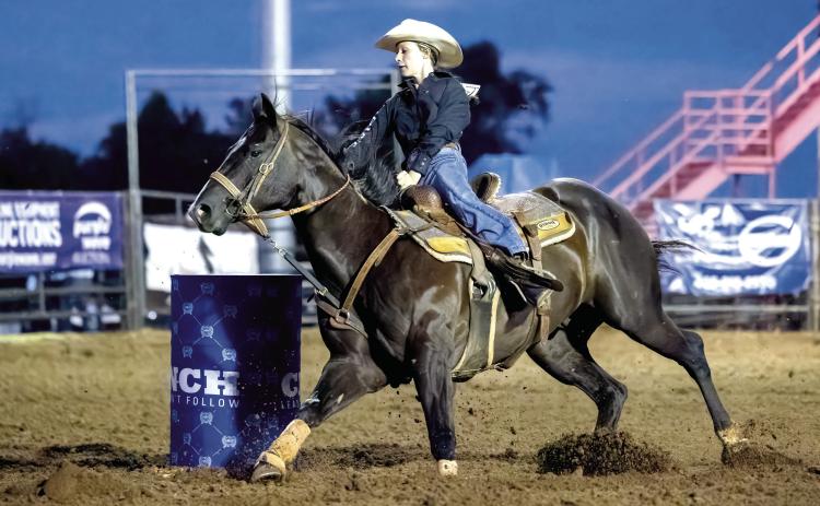 Jessica Staff, of Tecumseh, rounds a barrel in the 32nd Annual International Finals Youth Rodeo on July 8 at the Heart of Oklahoma Expo Center. File photo courtesy of Richelle Treece.