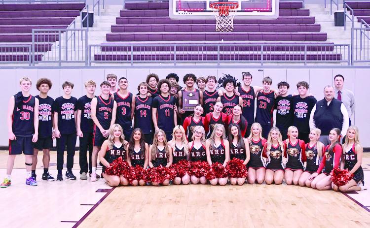 NRC boys claim the Area Championsip, beating Catoosa, 69-54, and moved on to State play on Mar. 10. NRC lost a buzzer beater against Fort Gibson to end their season at the new OG&amp;E Coliseum. See next week's issue for those photos. Photo Courtesy of Gowin Photography