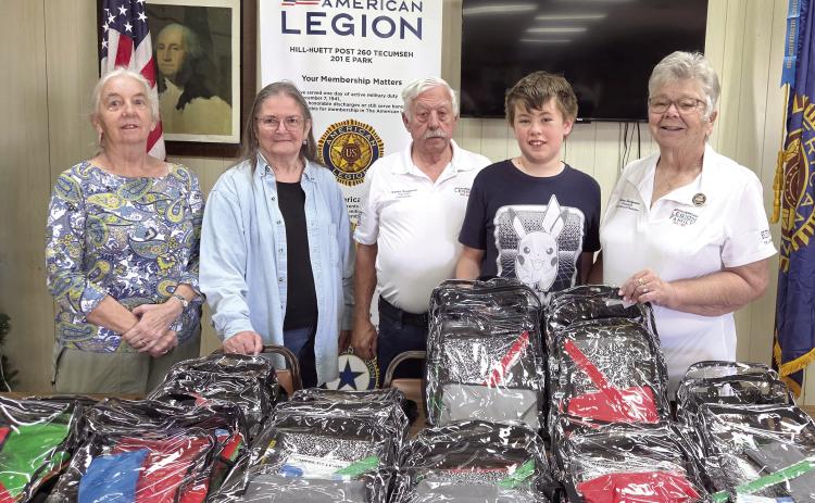Tecumseh's American Legion Hill-Huett Post 260 donated 10 backpacks filled with school supplies to Cross Timbers Elementary School on Aug. 5. Shown, from left, are Auxiliary members Carolyn Rose and Julia Watters; Post Commander Tom Snodgrass, Sons of the American Legion; Daryl Murray and Oklahoma Auxiliary Department President Donna Snodgrass. Photo provided