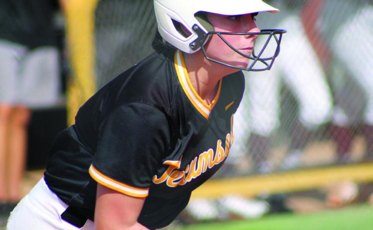 Tecumseh’s Bristin Hayes runs after hitting a single in the first inning of the game against Blanchard on Aug. 8. Hayes was the only one to cross home base that day. The first Tecumseh fastpitch home game of the season took a break for lightning after the second inning and was eventually rained out. Countywide &amp; Sun/ Natasha Dunagan