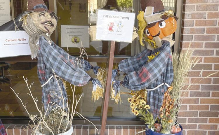 “The Gemini Twins,” by Leslie Hubbard and Whitney Abel, won first place out of three entries in the City of Tecumseh Employees Scarecrow Contest. Photos provided by Cathy Condit.