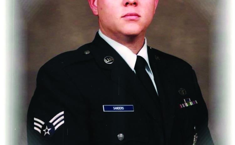 Tecumseh Police Sergeant J.D. Sanders is shown in dress uniform for the Air National Guard in 1996.