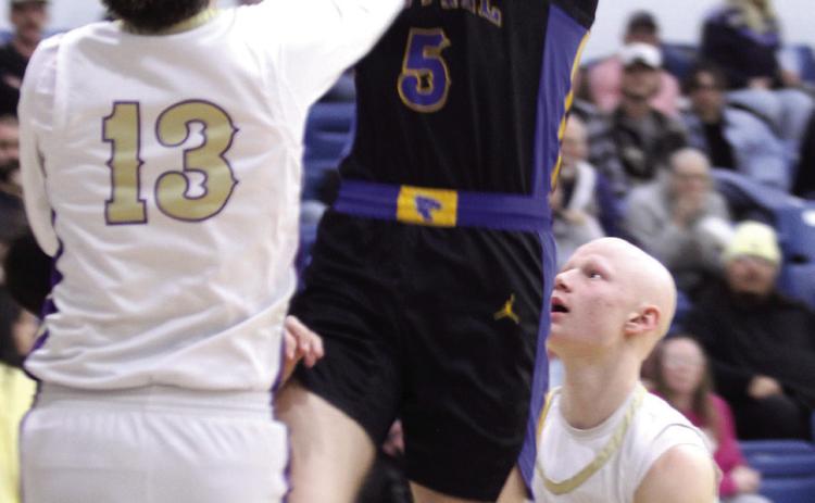 Bethel senior Zack Jennings goes to the bucket and gets fouled. Photos by Natasha Dunagan, Countywide &amp; Sun