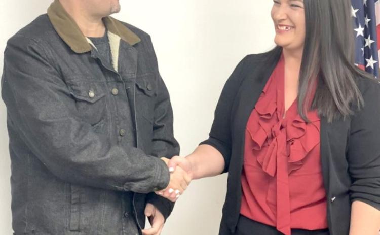DA Allan Grubb (left) welcomes Kayxandra Koonce as the new Executive Director of the Child Advocacy Center at the Pottawatomie County Commissioners meeting Monday, Dec. 20, 2021. Koonce will officially begin in her new roll on Monday, Jan. 3, 2022.