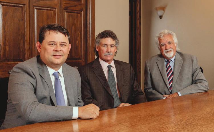 Pictured from left are J. Shawn Spencer, attorney; Bradley C. West, managing partner; and Terry W. West, founder. Photo provided