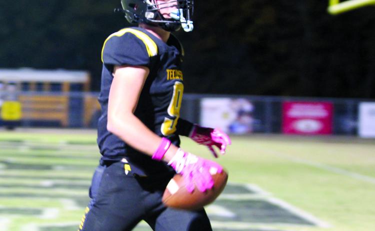 Tecumseh senior Kaeson Pine catches a pass in the endzone for a touchdown during the district home game with Chickasha on Oct. 25. The Savages lost in overtime, 41-47. Countywide & Sun/Natasha Dunagan
