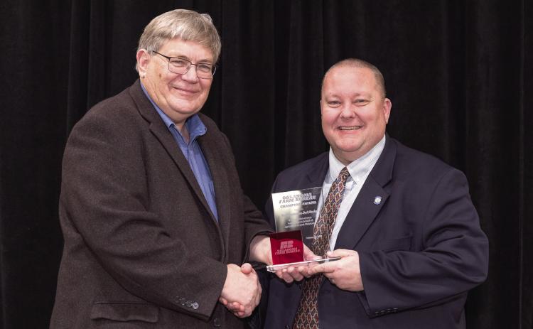 Oklahoma Farm Bureau President Rodd Moesel presents Rep. Dell Kerbs with an Oklahoma Farm Bureau Champion Award at the 2023 OKFB Leadership Conference Feb. 21. Photo provided