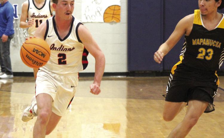 Asher’s Raygan Kuhlman drives to the hoop and scores two points during the Feb. 10 Class B District game with Wapanucka, held at home. After getting a bye on the Feb. 9 game, the Indians won, 67-34. The Lady Indians also won their District game that night against Legacy Christian School, 45-14. Both teams will play in the Class B Regionals tonight in Chattanooga. Countywide &amp; Sun/Natasha Dunagan