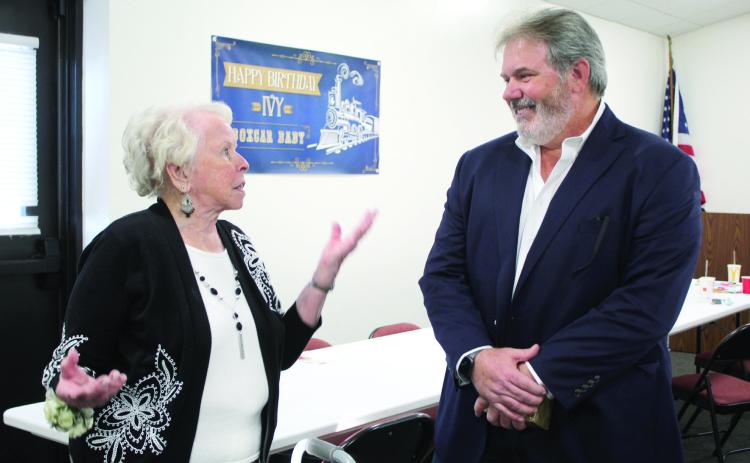 “Boxcar Baby” Ivy Winter talks with Shawnee Mayor Eric Stephens during her 95th birthday party, held at the Pottawatomie County Historical Society Museum on Dec. 12. Winter was born on a boxcar in Shawnee on Dec. 14, 1929. Countywide & Sun/Natasha Dunagan
