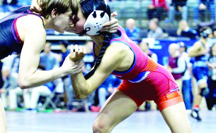 Vivian Hayes’ wins by pin and advances to the semis match at Nationals on Mar. 6-7 Photo Courtesy of Murray State College