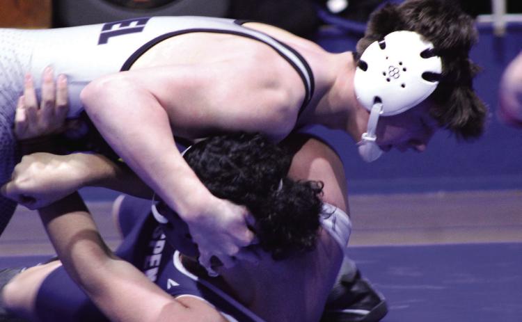 Bethel senior Zane Anderson pins his Star Spencer opponent for the win during the Bethel Tri-Dual and Senior Night on Jan. 20. The Wildcats also faced Mount St. Mary's wrestlers.