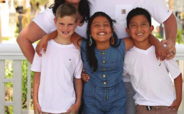 KC and David Koonce with their children.