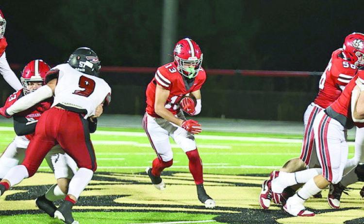 NRC's Reid Rollins finds a big hole for a first down. NRC lost to Plainview 21-18 on Halloween. They will play their last regular season (senior night) game against Anadarko on Nov. 7. Photo Courtesy of Gowin Photography