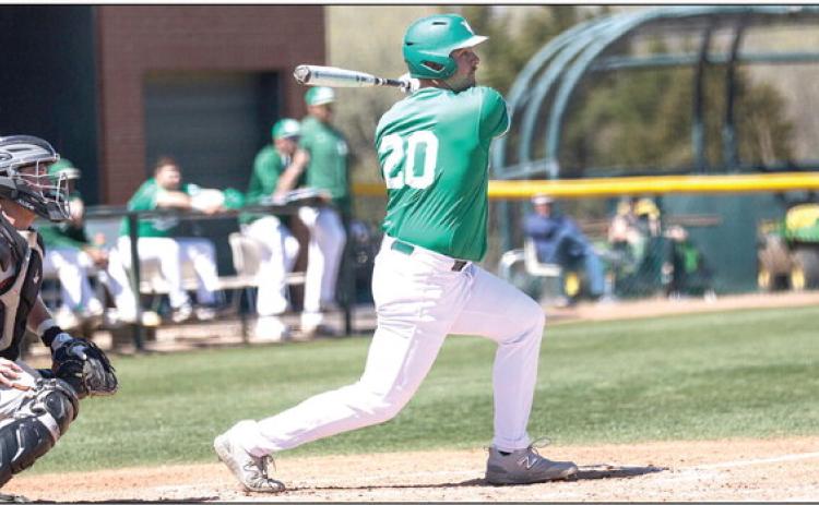 Oklahoma Baptist University’s Kade Self knock the ball into play in action against Northeastern State Tuesday, May 2. OBU won 12-7 and will take on Arkansas Tech Friday, May 5 in the Great American Conference Tournament. Photo provided