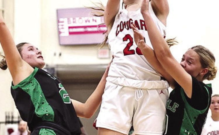 North Rock Creek's Kadence Munn sinks in two of her 17 points in the home game against Seminole. The Lady Cougars dominated the Chieftains in the 75-10 win. Photo Courtesy of Gowin Photography