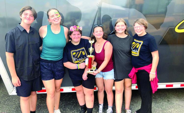 Tecumseh Color Guard members, Levi Carter, Adelaide Lack, Kimberlynn Harris, Emma Wilson, Cydny Stell and Kaitlyn Stell, take home second place in the Best Color Guard in 4A category at the Oklahoma State Fair Marching Band Parade Contest on Sept. 15. Photo Provided