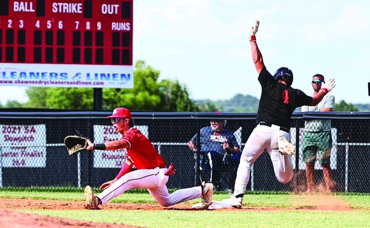 North Rock Creek took on Meeker Tuesday night, June 25, 2024, at NRC. Meeker’s runner stretches to beat the throw to first. The Cougars split with the Bulldogs. NRC varsity won 12-4 and the Bulldogs JV won 9-1.