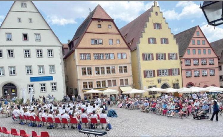 The Oklahoma Ambassadors of Music, including two band students from Bethel High School, perform in Germany in June. Photo provided.