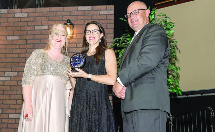 Lacey Holt, Executive Director of Legacy Parenting Center, receiving The LIVE UNITED award from Sandy Vanderburg and Casey Bell. Photo provided