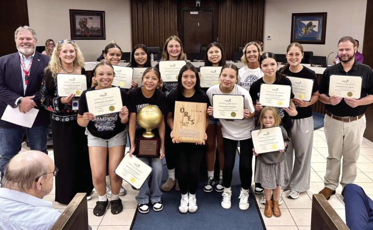 The Pleasant Grove Lady Warriors Three-time Basketball Champions were recognized at the Shawnee City Commission meeting April 20. Back row: Mayor Stephens, Sally Thomason, Syniah Grayson, Chulve Roubioux, Kerrigan Wootten, Laila Shields, Coach Wootten, Coach Tramble and Bryan Guthrie. Front row: Brylee Cosby, Devyn Arriaga, Clarissa Lena, Jada Pleets, Anessa Hamon and Collins Wootten. Not pictured: Alize Zidor and Coach Lambert Photo Provided