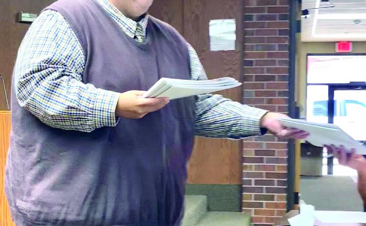 Oklahoma Film & Music Office Outreach and Production Manager, Yousef Kazemi passed out packets to the Tecumseh City Council explaining the Oklahoma Film and Music Incentive Program. Julie Talton, Countywide & Sun