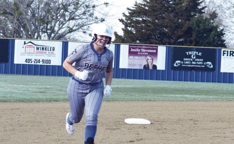 Payton Epperly makes her way around the bases after hitting a grand slam against Harding Charter on March 12. The Lady Wildcats walked away with a run rule 15-1 and then offered up some players to their opponet for the JV game that followed. Countywide &amp; Sun /Julie Talton