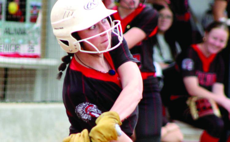 McLoud senior Alivia Scott prepares for a hit. Natasha Dunagan, Countywide &amp; Sun