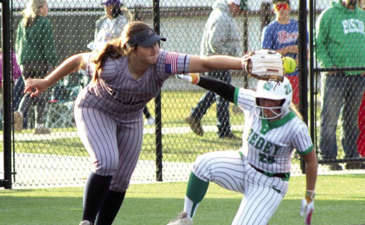 Asher freshman Karley King reaches for the catch at third base during the second inning of the Class B Slow Pitch State Championship game against Leedey, held at FireLake Ball Fields on May 6. The Lady Indians won the quarterfinals with Big Pasture, 4-3, and the semifinals against Lookeba-Sickles, 5-0, before falling to Leedey, 10-12. They end their season as the state runner-up, with a record of 28-9.