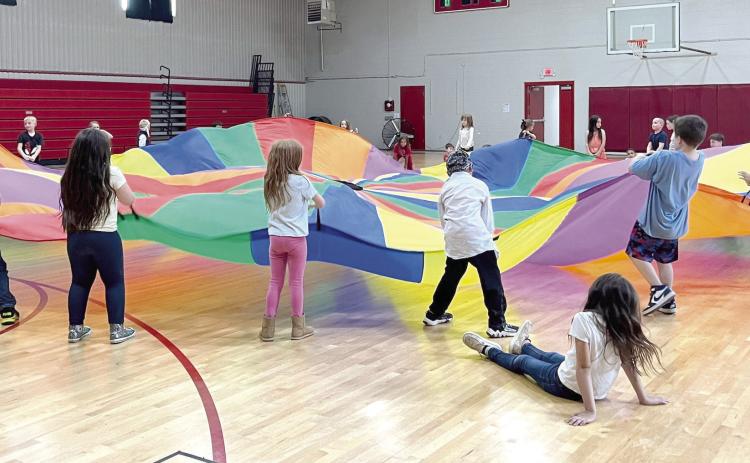 The $20,000 Healthy Incentive Grant received by McLoud Public Schools is used to promote healthy active lifestyles. The funding has been used to purchase balance boards and a large rainbow parachute as pictured above.