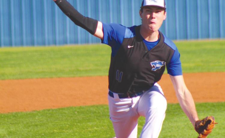 Bethel junior Bronc Robbins pitches during the third inning of the first home game against Heritage Hall on April 8.